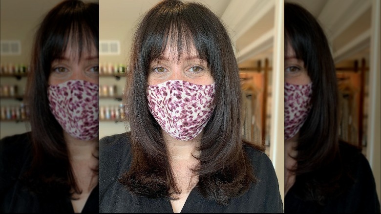 Curled under long layers with skinny fringe 