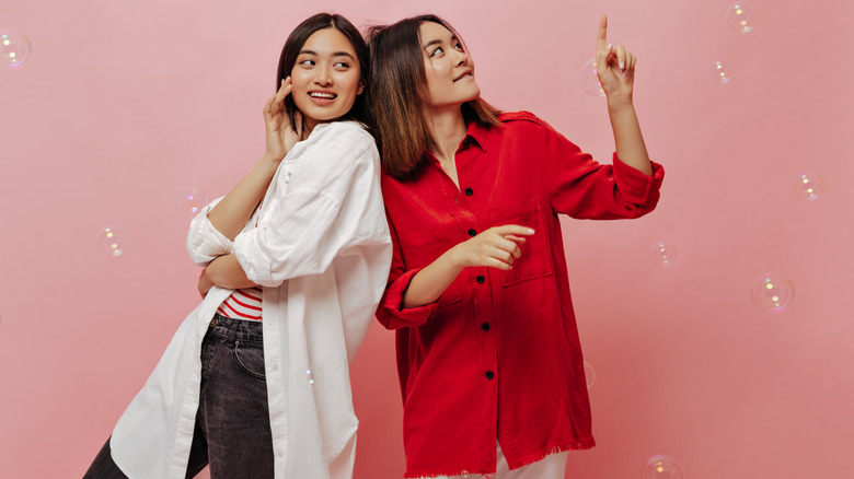 women with oversized blouses