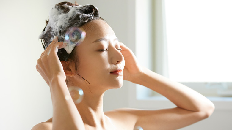 woman using hair mask