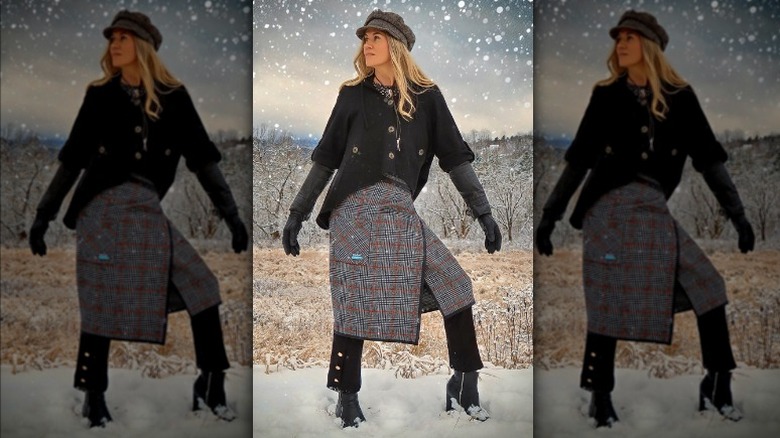 Woman wearing layers in the snow