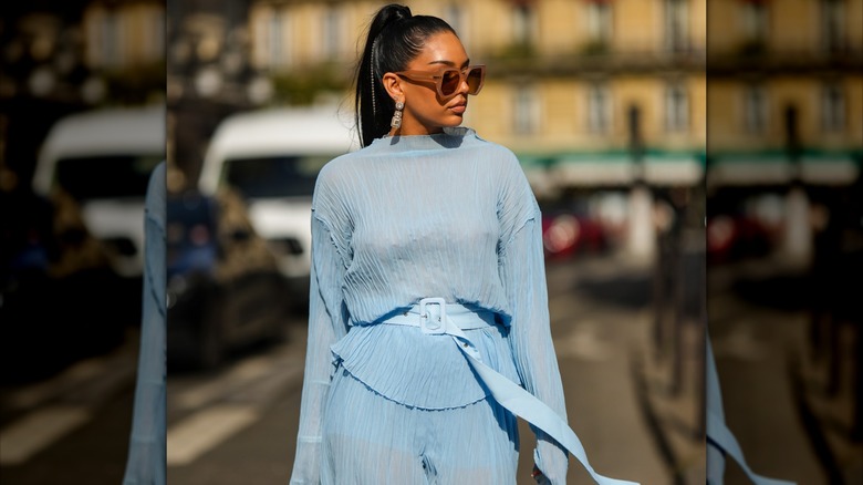 woman in light blue outfit