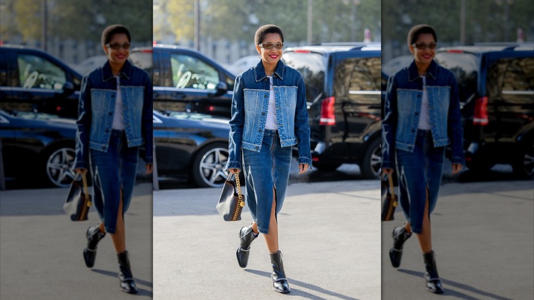 woman wearing denim midi skirt