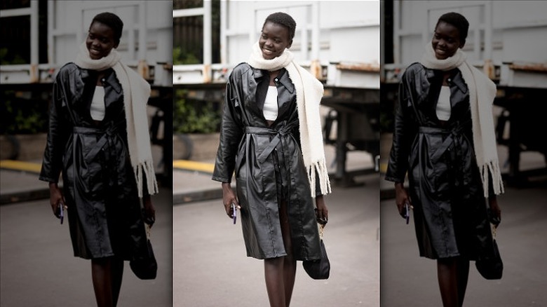 woman wearing leather trench coat
