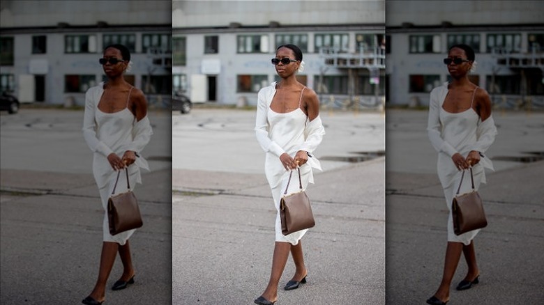 woman wearing white slip dress