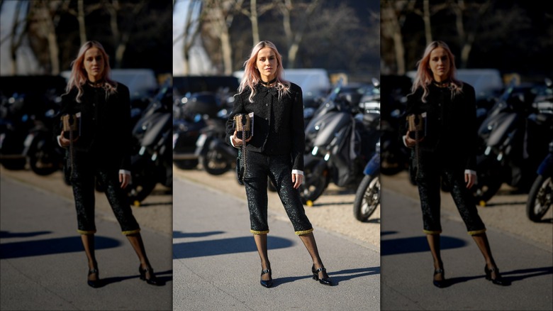 woman wearing sequined capris