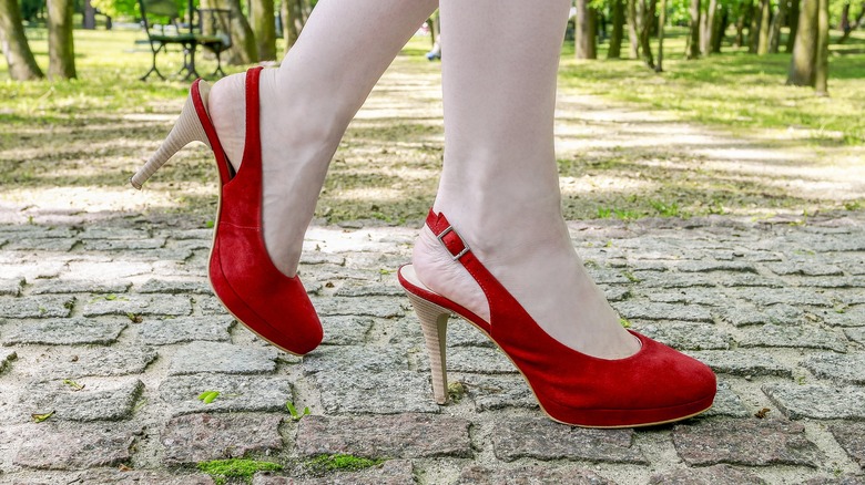 woman wearing lime slingback heels