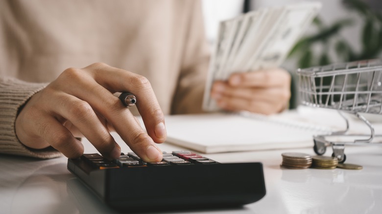 person calculating money