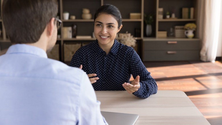 woman speaking with professional