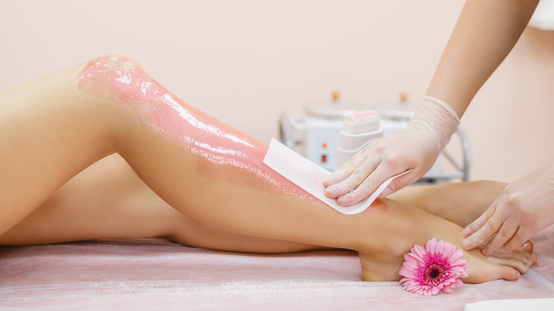 waxing legs with wax strip