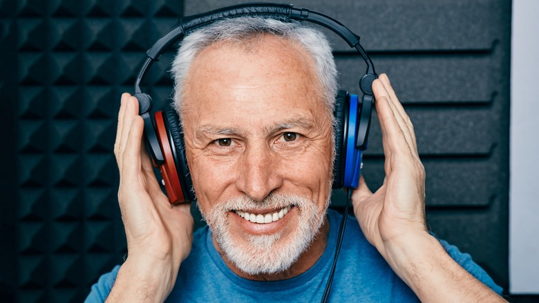 Smiling man wearing headphones