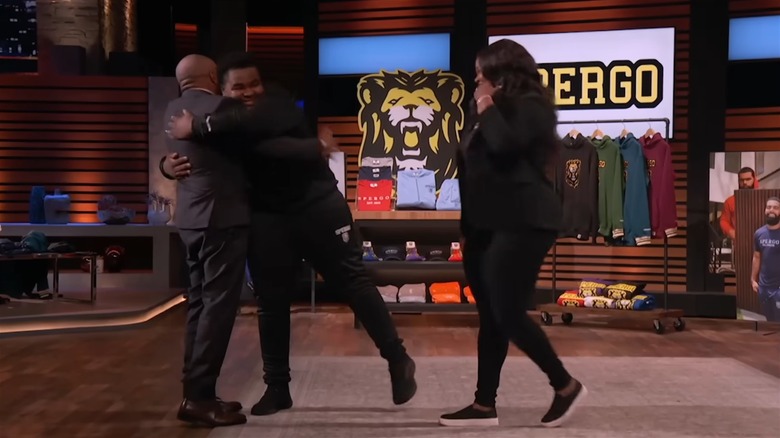 Brown and John hug on "Shark Tank"