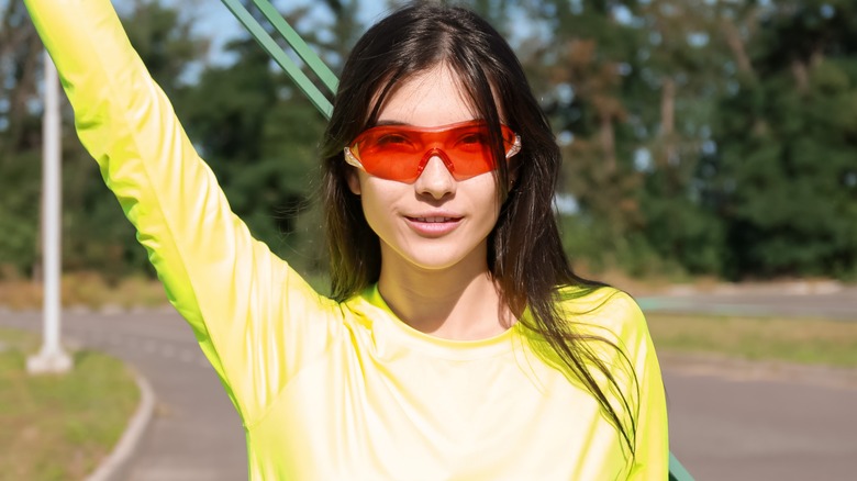 Woman wearing sporty sunglasses