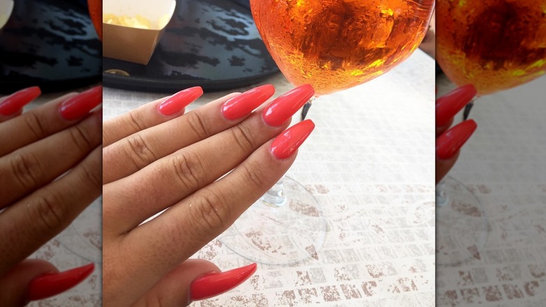 long fingernails and drink