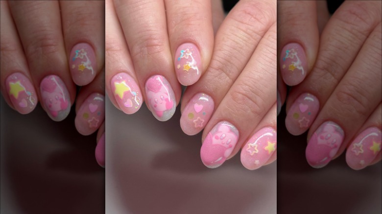 woman with pink star nails