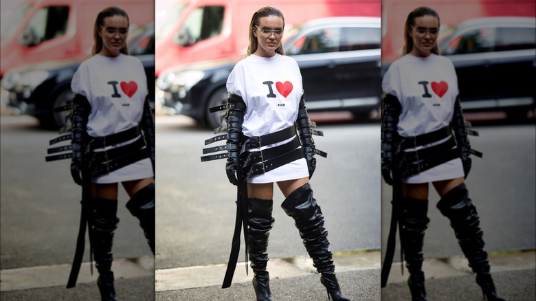 woman wearing triple belt