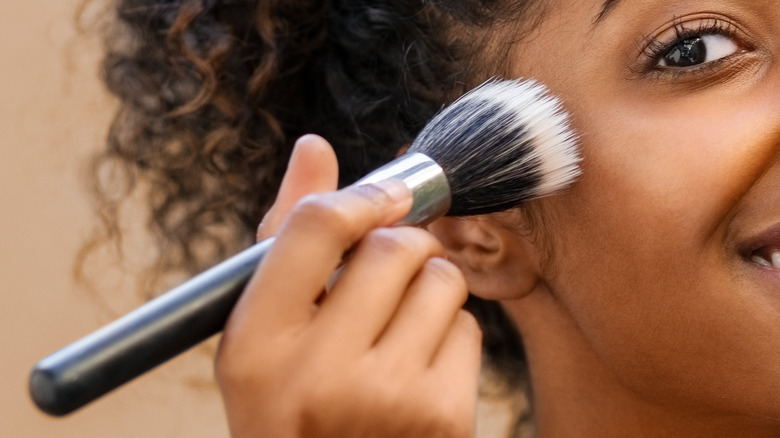 woman using a stippling brush 