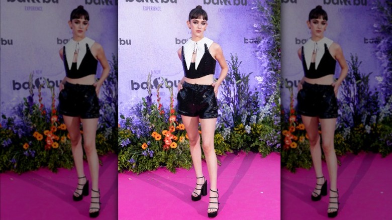 Black sequin shorts and strappy black sandals