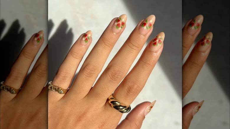 Strawberry and daisy nails