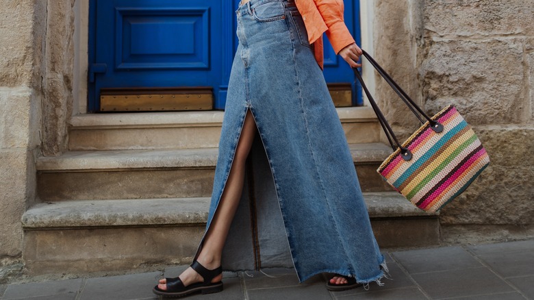 Striped handbag with denim skirt