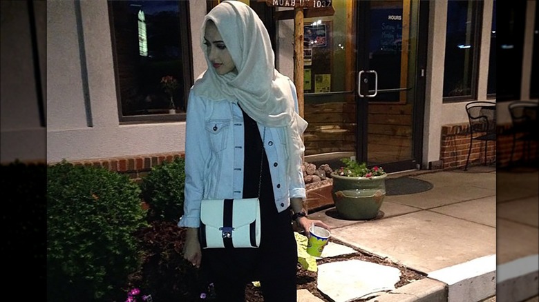 White purse with black stripes