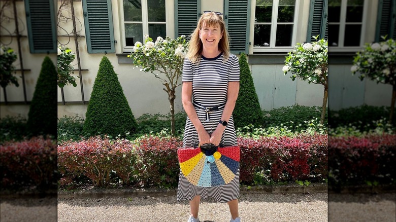 Striped dress and woven bag