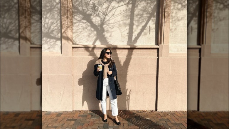 Person in black ballet flats