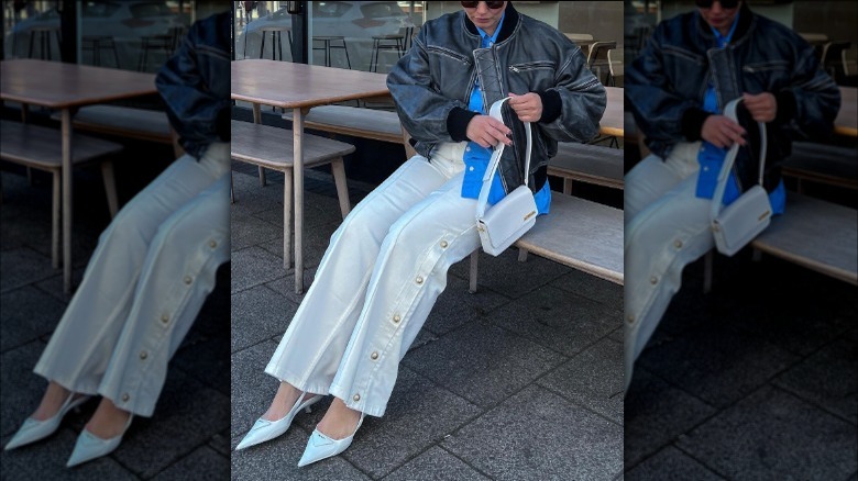 Person in silver slingback heels