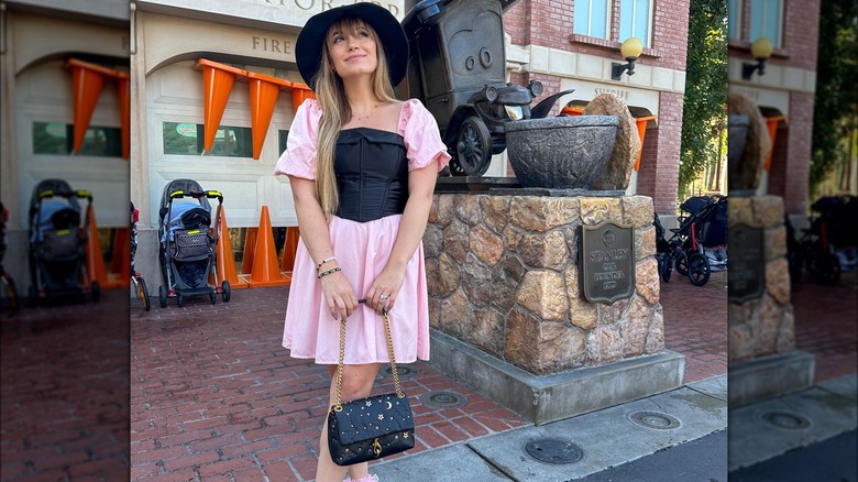 Girl wearing a star studded bag