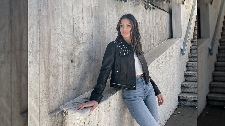 Girl wearing a studded leather jacket