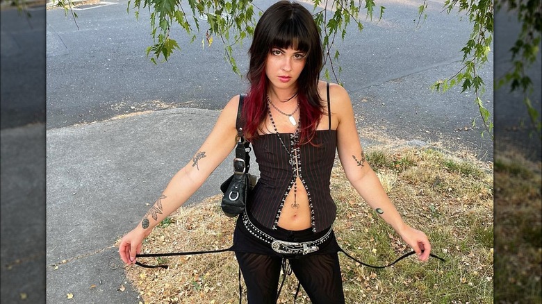 Girl wearing a studded belt