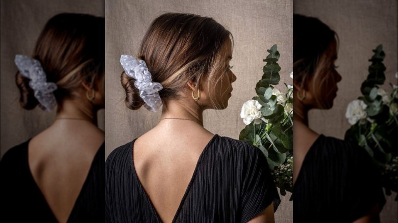 Woman wearing a scrunchie