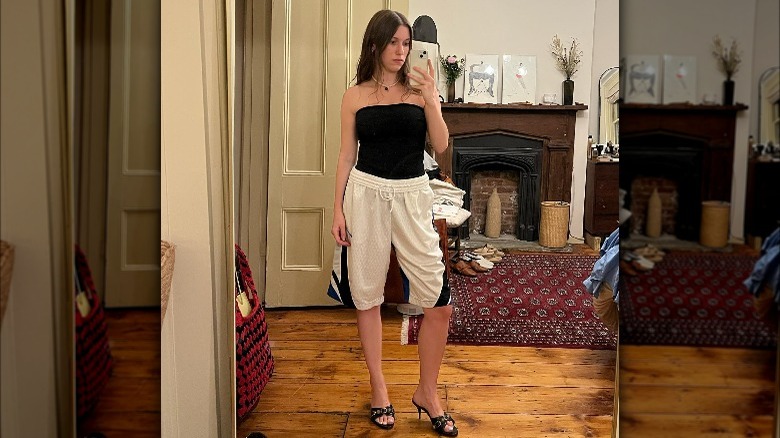 Influencer wears basketball shorts elegantly