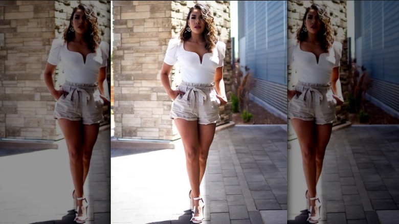 short beige paperbag shorts white top