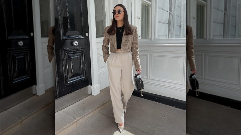 woman wearing cropped blazer and trousers