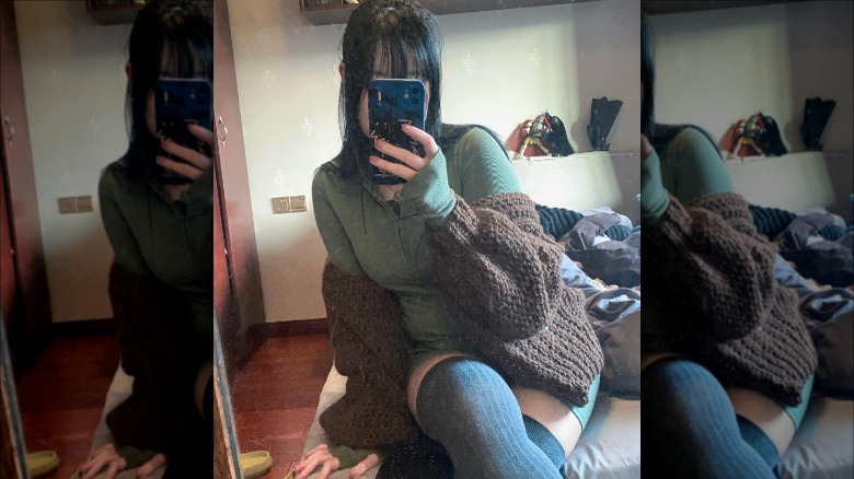 Woman wearing brown knit cardigan