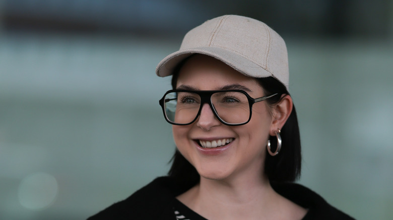 woman wearing chunky silver hoops