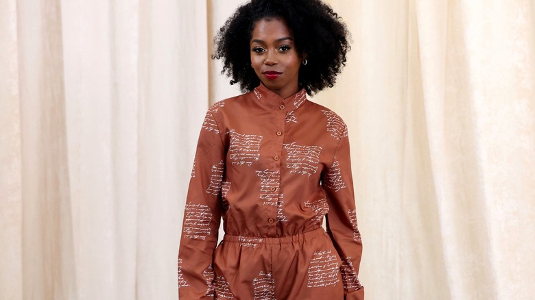 CultureCon guest wearing brown jumpsuit