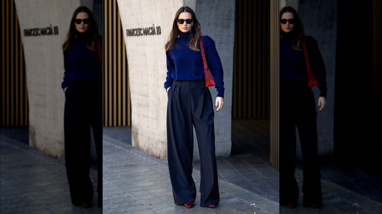 Zina Charkoplia wearing wide-legged trousers