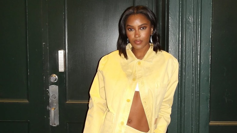 Ciara Miller posing with a wavy lob