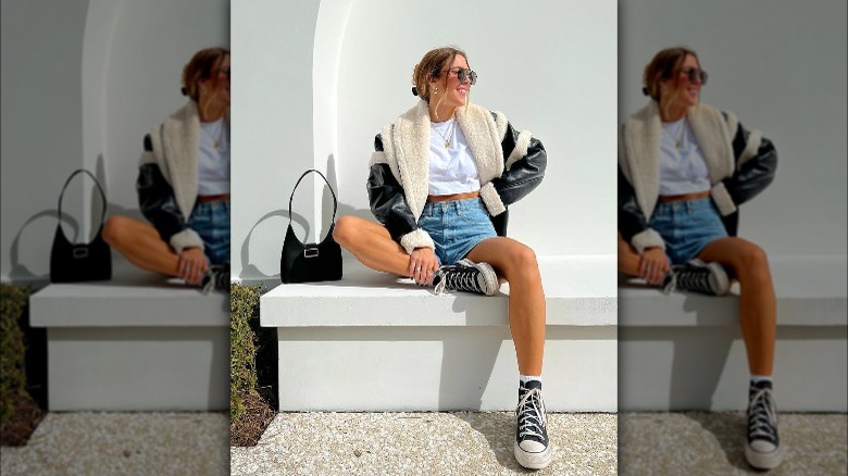 Woman wearing classic Chuck Taylors