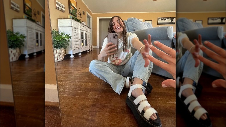 Woman wearing chunky white sandals