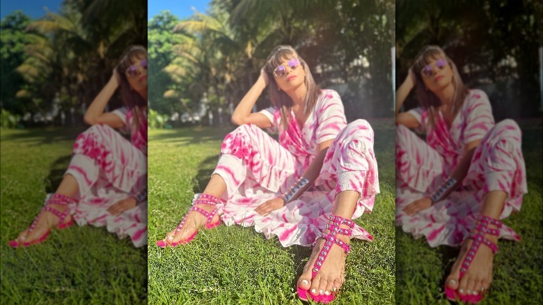 Woman wearing strappy flat sandals