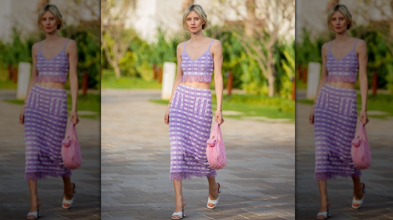 woman in top and skirt