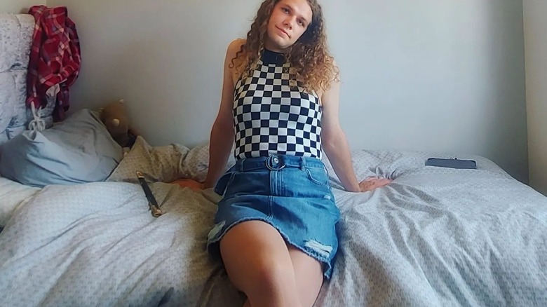 Sleeveless top and denim skirt