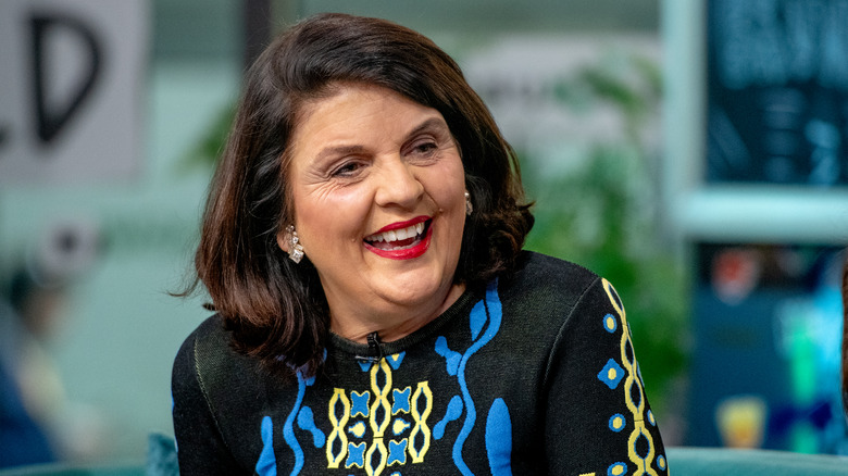 Susan Miller smiling during event