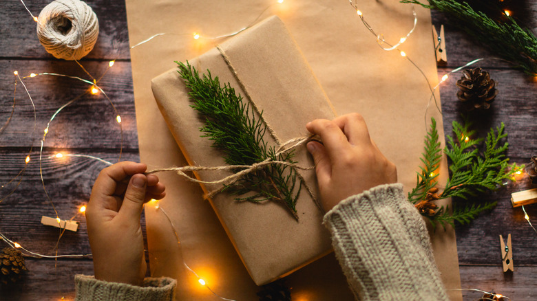 Wrapping gift in brown paper