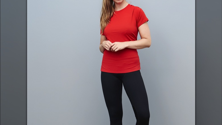 Woman wears crewneck tee