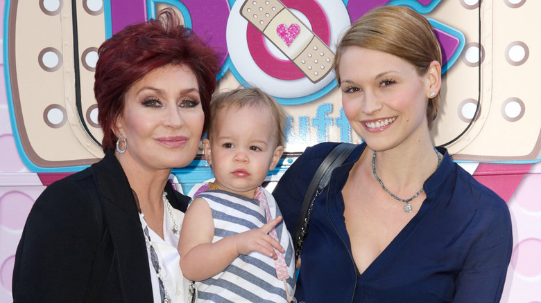 Sharon Osbourne posing with granddaughter Pearl and ex-daughter-in-law Stella