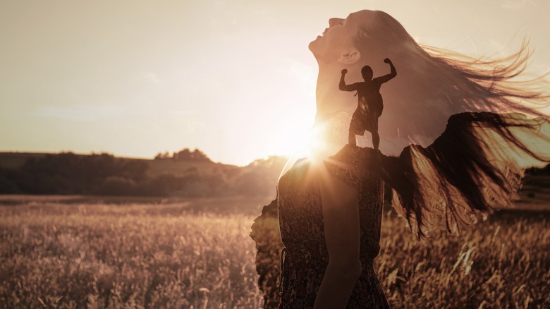 Silhouettes of strong, joyful woman
