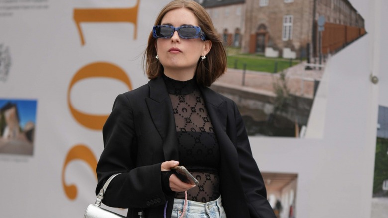 woman wearing sheer turtleneck